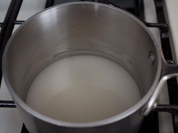 Water and sugar in pot for simple syrup.