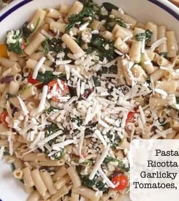 Pasta with Ricotta Salata, Spinach, Tomatoes, and Olives.