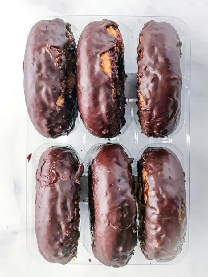 Six Aldi Gluten-Free Chocolate Frosted Doughnuts in Tray