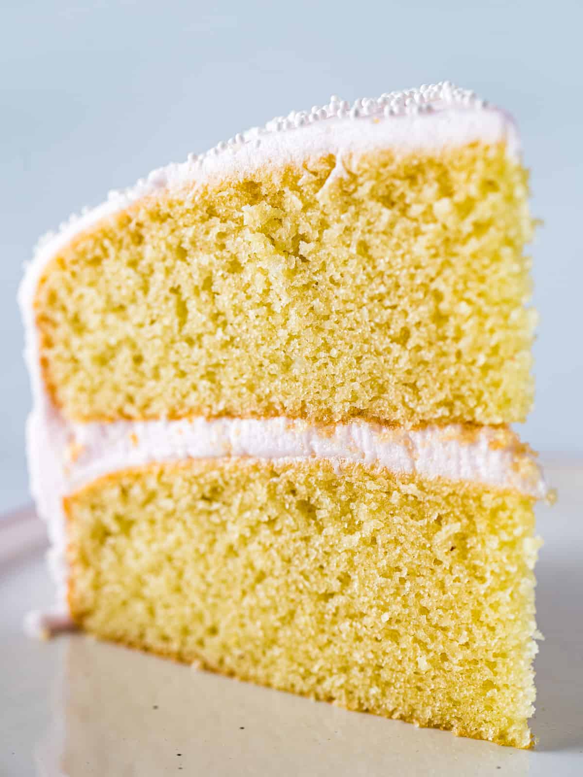 Slice of almond flour cake on a plate.