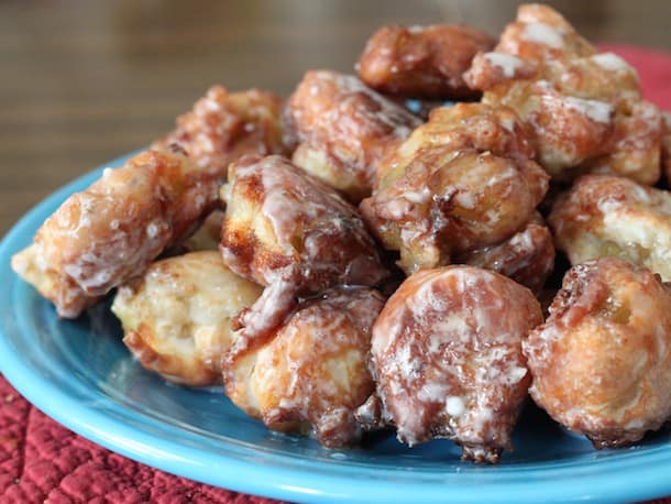 Gluten-Free Apple Fritters on a blue plate.