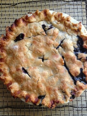 Gluten-Free Blueberry Pie on cooling rack.