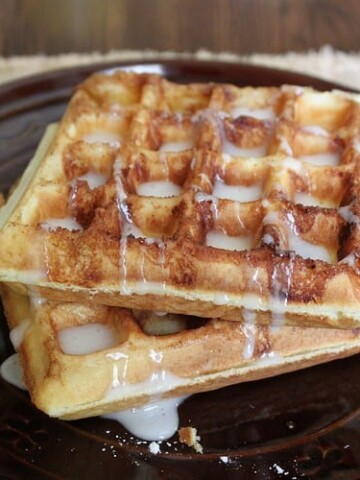 Gluten-Free Cinnamon Bun Waffles with sugar glaze.