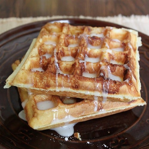 Gluten-Free Cinnamon Bun Waffles with sugar glaze.