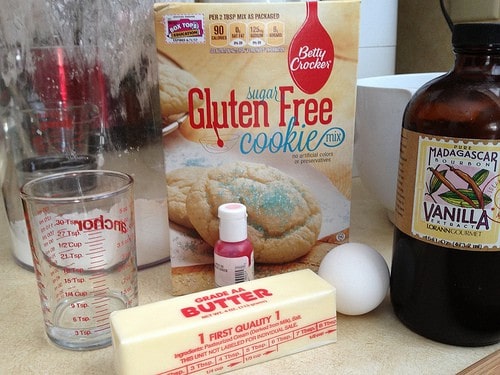 Ingredients for gluten-free sugar cookies on counter.