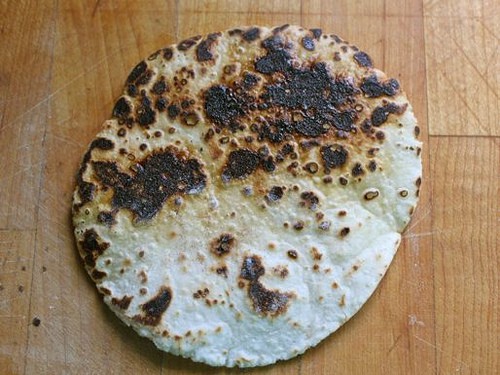 Burnt gluten-free flour tortilla.