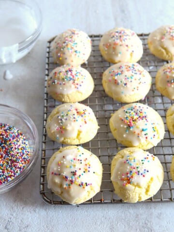 Gluten-Free Anginetti Cookies on a wire rack.