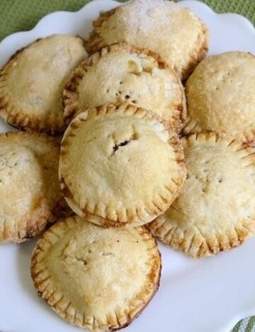 Gluten-Free Apple Hand Pies on a white platter.