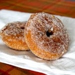 Gluten-Free Baked Pumpkin Doughnuts on a white napkin.