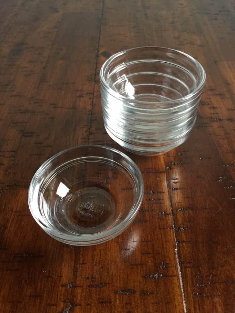 Stack of small glass bowls.