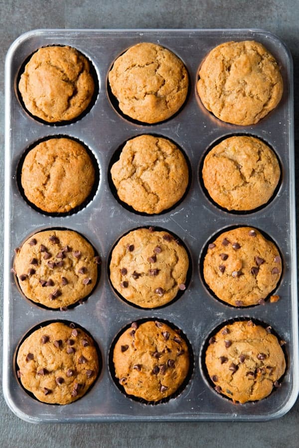 Gluten-free banana muffins in a muffin tin.