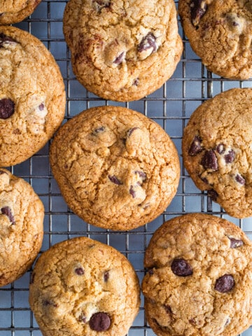 Gluten-Free chocolate chip cookies on a cooling rack.