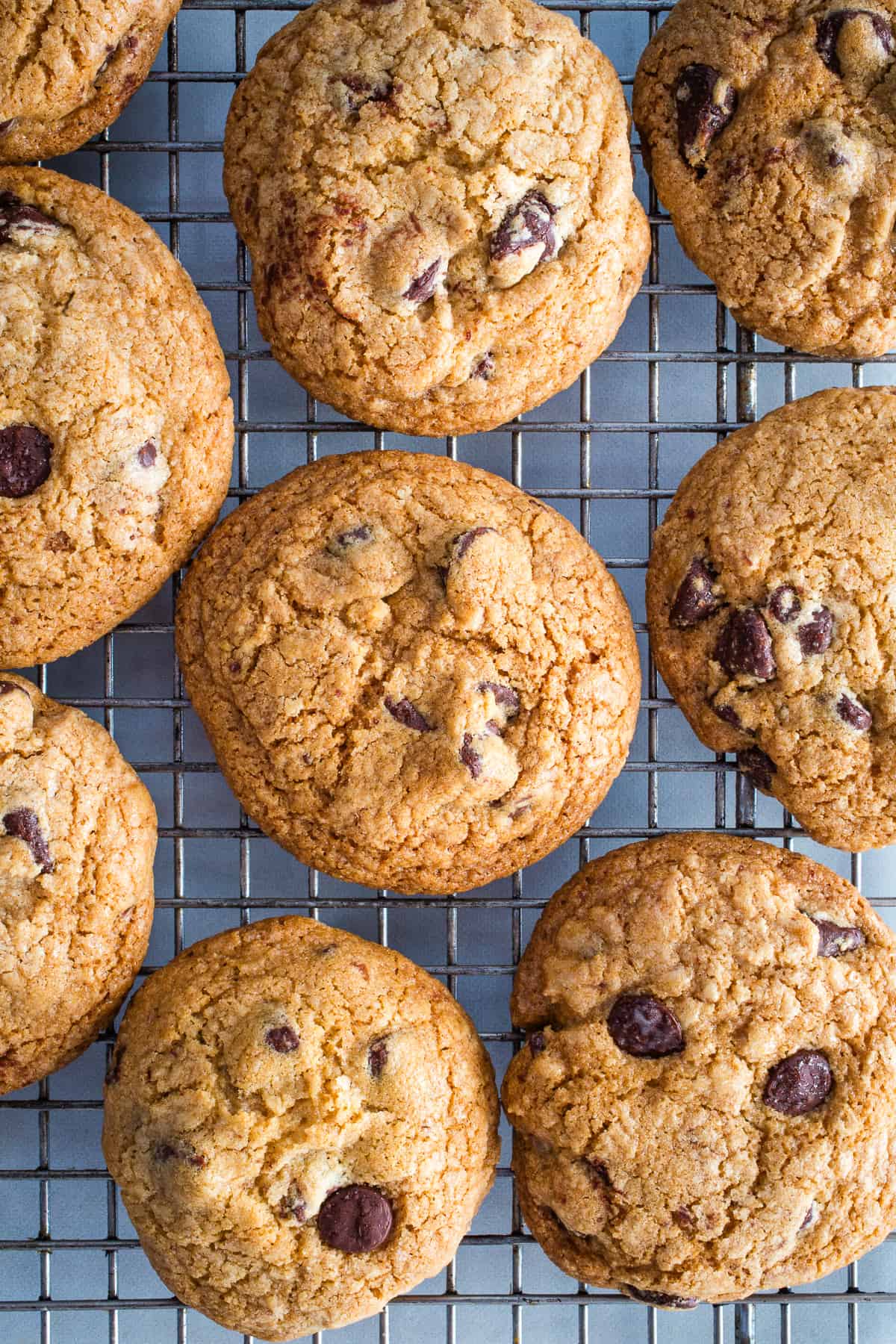 Gluten-Free chocolate chip cookies on a cooling rack.