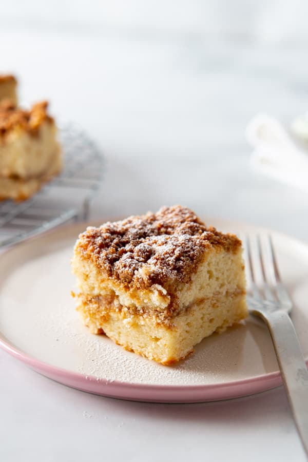 Slice of gluten-free coffee cake on a plate.