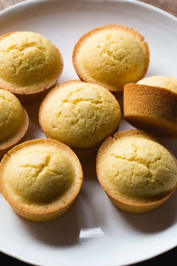 Gluten-Free Corn Muffins on a white plate.