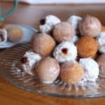 Gluten-free doughnut holes on plate.