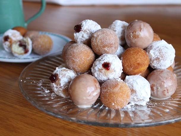 Gluten Free Doughnut Holes on a glass platter.