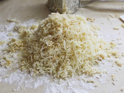 Grated potatoes for gluten-free gnocchi.