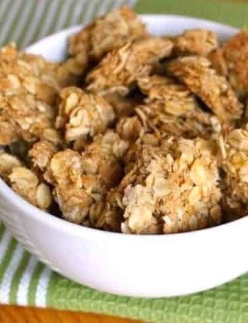 Crunchy gluten-free granola clusters in a bowl.