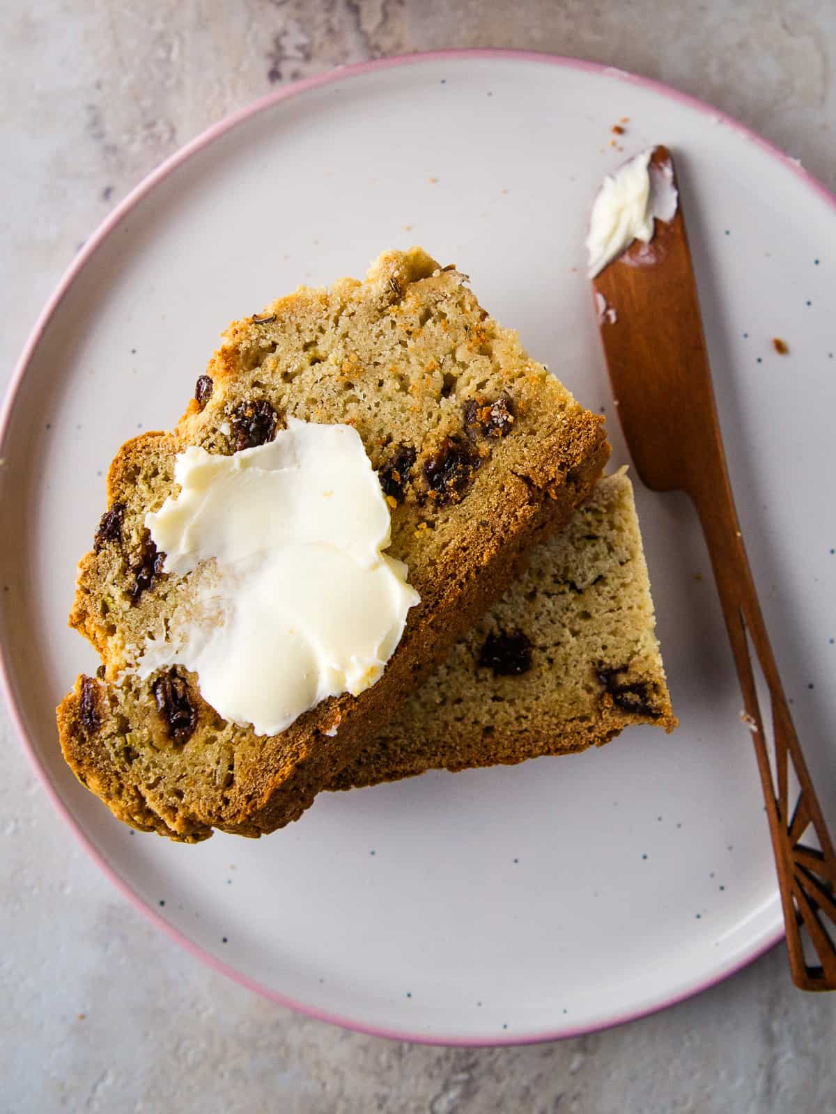 Butter spread on a slice of gluten-free Irish soda bread.