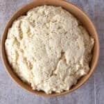 Gluten-free Italian Easter dough risen in bowl.