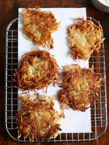 Gluten-Free Latkes on wire rack.