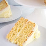 Slice of gluten-free lemon cake on a white plate.