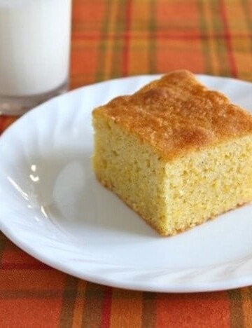 Gluten-free maple cornbread on a white plate.