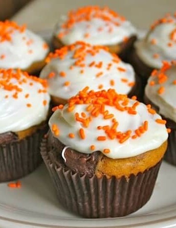 Gluten-Free Chocolate Marble Pumpkin Cupcakes on a plate.