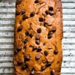 Baked gluten-free peanut butter banana bread on cooling rack.