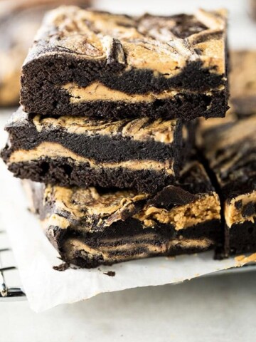 Stack of gluten-free peanut butter brownies.