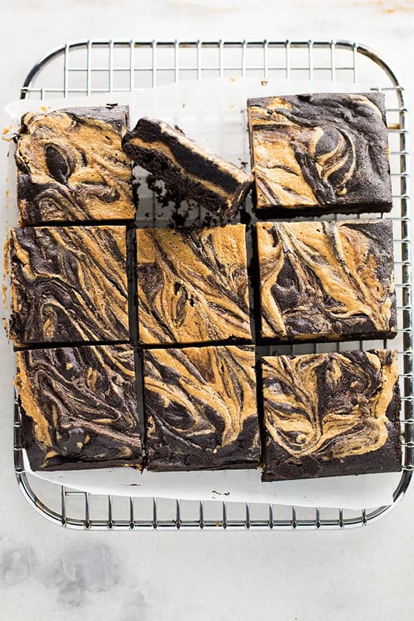 Gluten-Free peanut butter brownies cut on a wire rack.