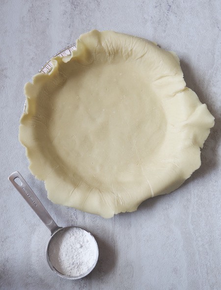 Gluten Free Pie Crust pressed into pan. 