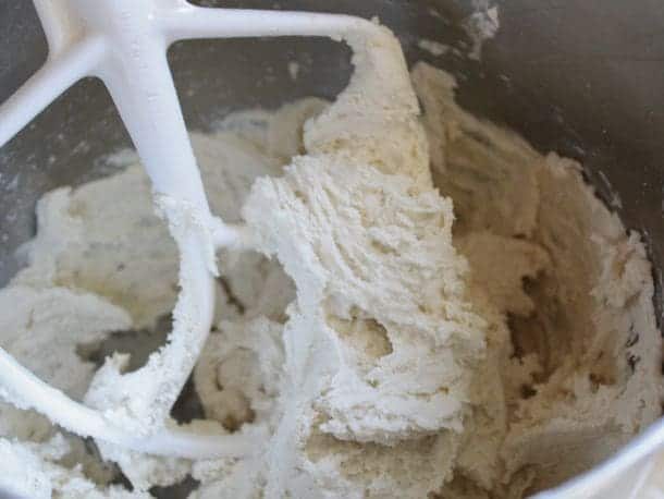 Gluten-Free Soft Pretzel dough being mixed in a stand mixer.