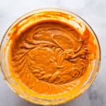 Gluten-free pumpkin bread batter in a mixing bowl.