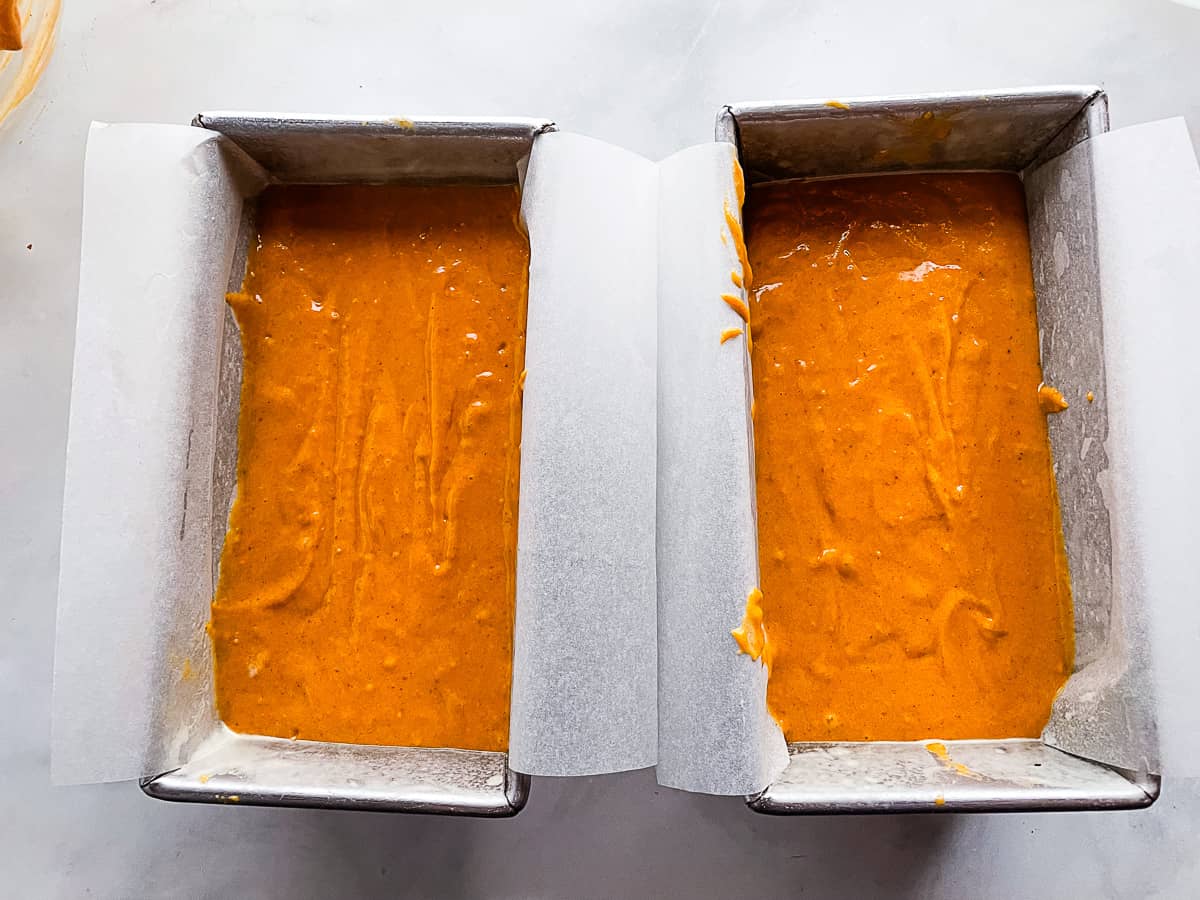 Gluten-free pumpkin bread in pans side by side.