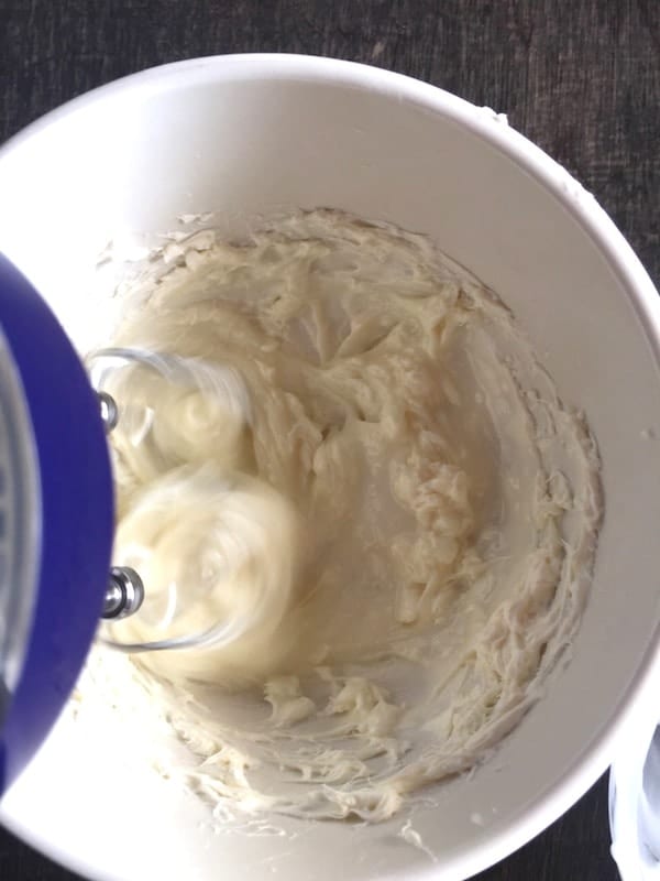 Mixing cream cheese icing.