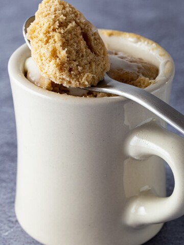 White mug with gluten-free spice mug cake