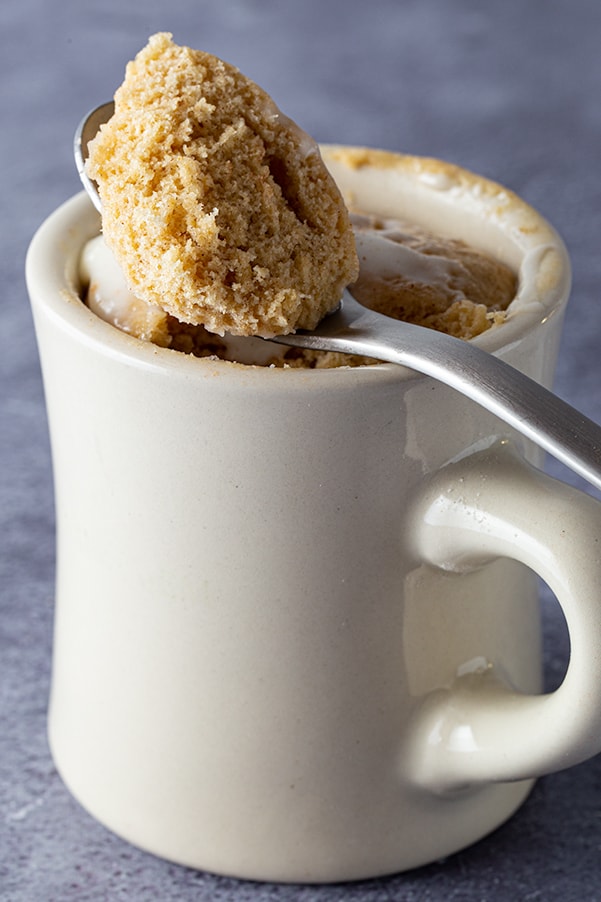 White mug with gluten-free spice mug cake