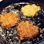 Gluten-free sweet potato latkes frying.