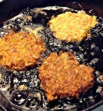 Gluten-free sweet potato latkes frying.