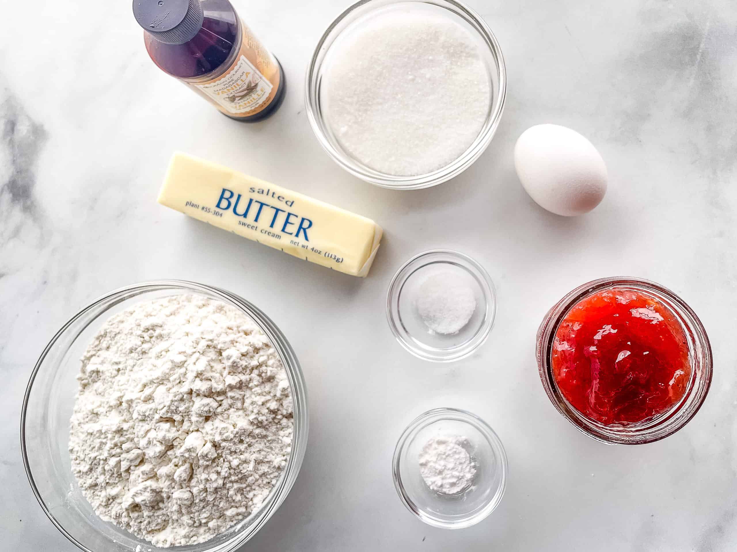 Ingredients for gluten-free thumbprint cookies on the counter.