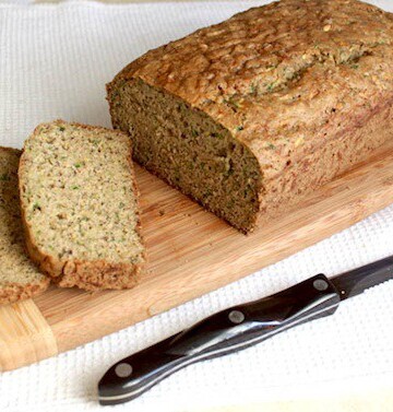 Gluten-Free Zucchini Bread on wood cutting board.