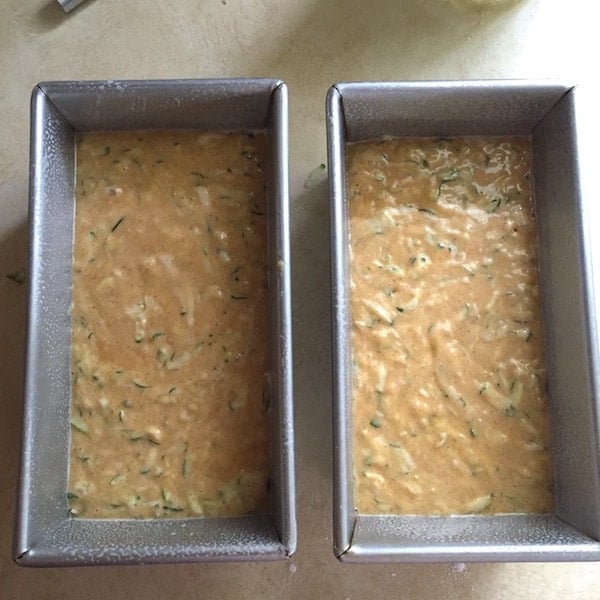 Gluten-free zucchini bread batter in two loaf pans.