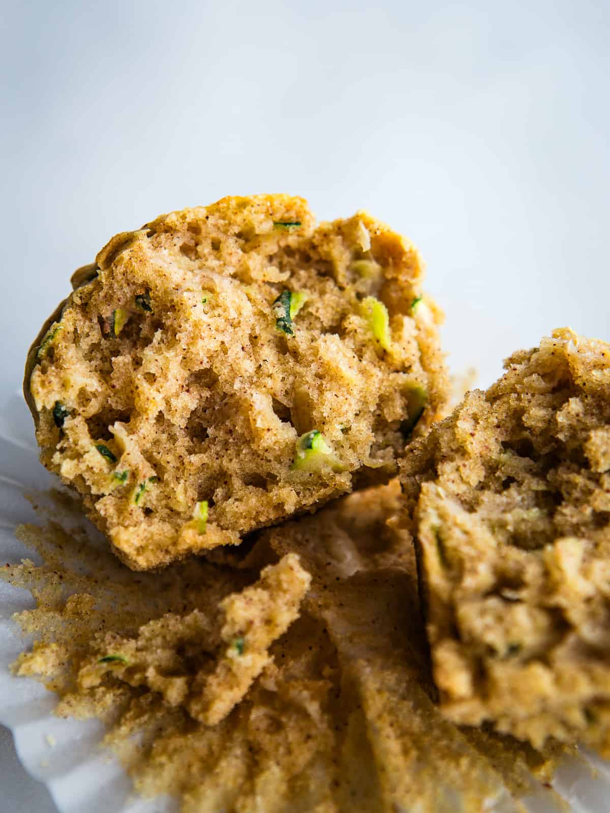 Gluten-free zucchini muffin split in half.