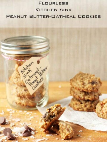 Kitchen Sink Oatmeal Peanut Butter cookies on wood cutting board.