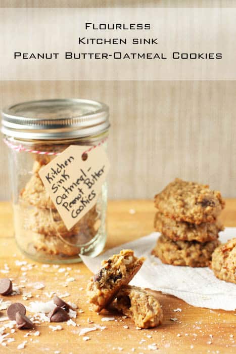 Kitchen Sink Oatmeal Peanut Butter cookies on wood cutting board.