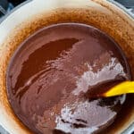 Melted chocolate for gluten-free brownies.