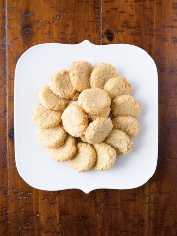 World's easiest almond cookies on white plate.