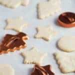 Gluten-free cut out cookies in the shape of a star, tree, and round.